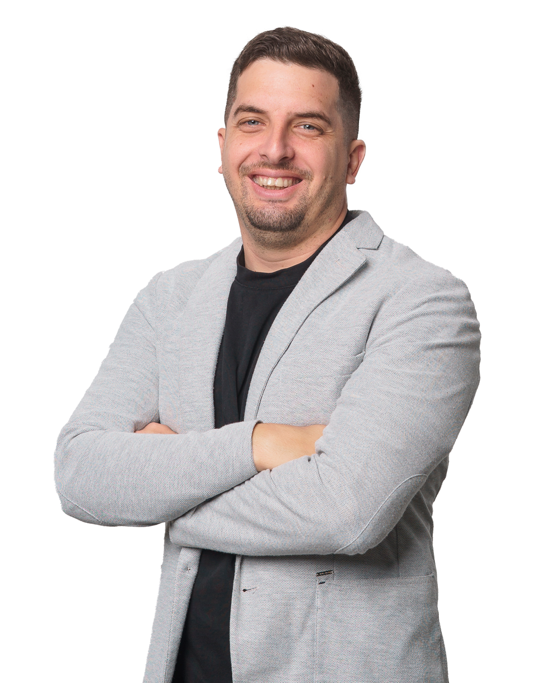 Javier Abrante de brazos cruzados y sonriendo